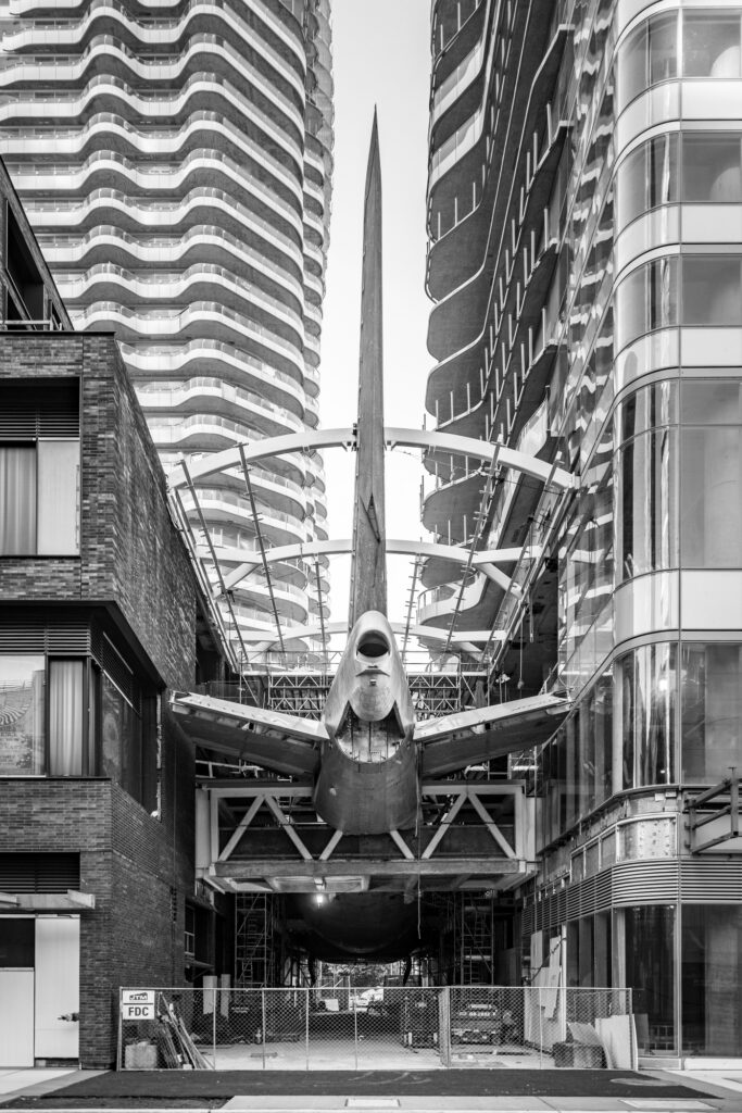 Rear view of the Boeing 747 suspended between twin towers at the Aero1200 development in Seattle's Denny Triangle.