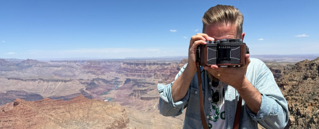 photo of Jaime Vedres shooting the Widelux camera at the Grand Canyon.